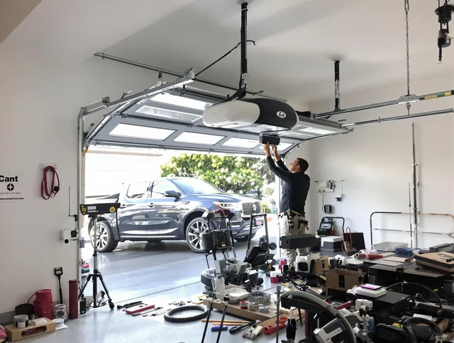 North Ridgeville Garage Door Repair specialist installing smart garage door opener system in North Ridgeville home