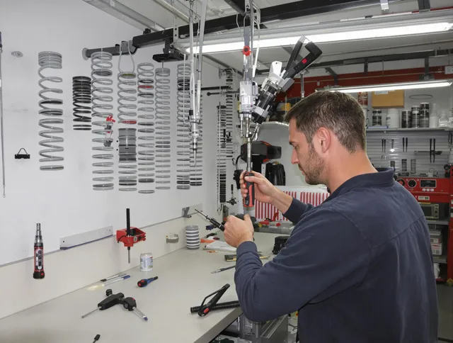 North Ridgeville Garage Door Repair safety certified technician performing precision spring replacement in North Ridgeville