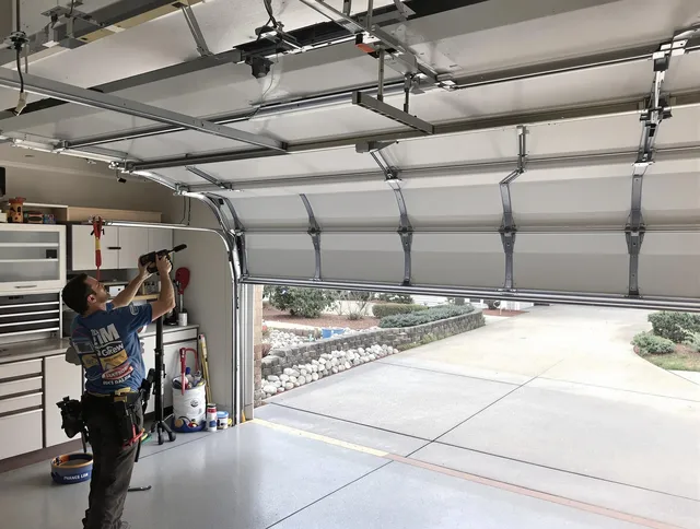 Garage door track repair service by North Ridgeville Garage Door Repair in North Ridgeville